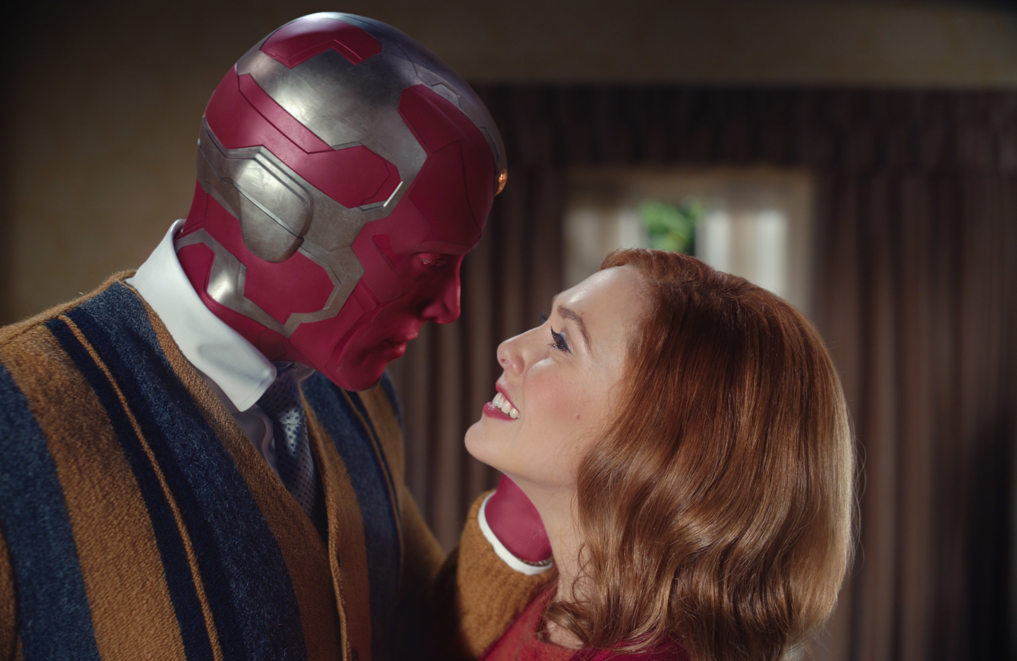 Vision and Wanda in the Emmy-winning 'WandaVision' facing each other in embrace