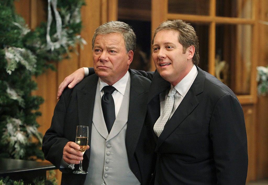 William Shatner and James Spader are dressed in suits. Spader has his arm around Shatner in this screen grab from 'The Practice'.