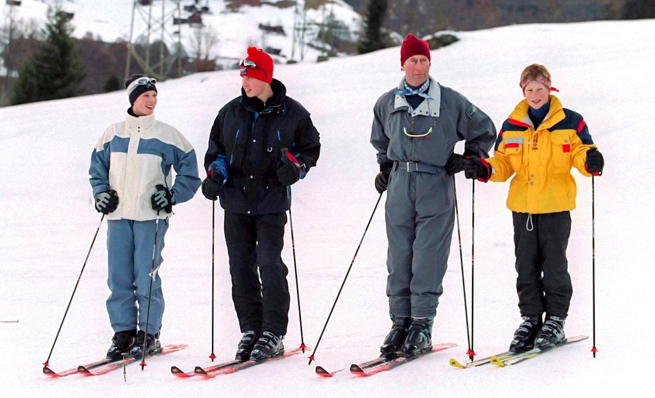 Zara Tindall, Prince William, Prince Charles, and Prince Harry skiing next to each other