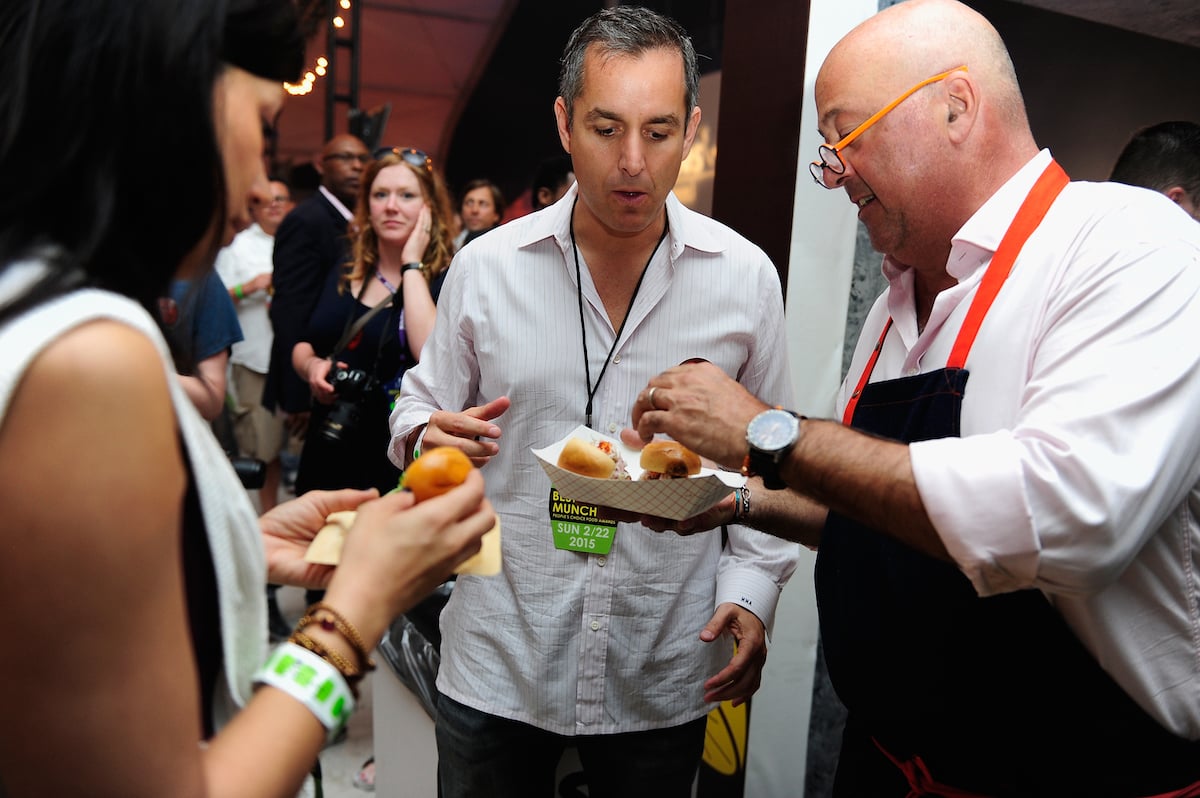 Andrew Zimmern eating with friends