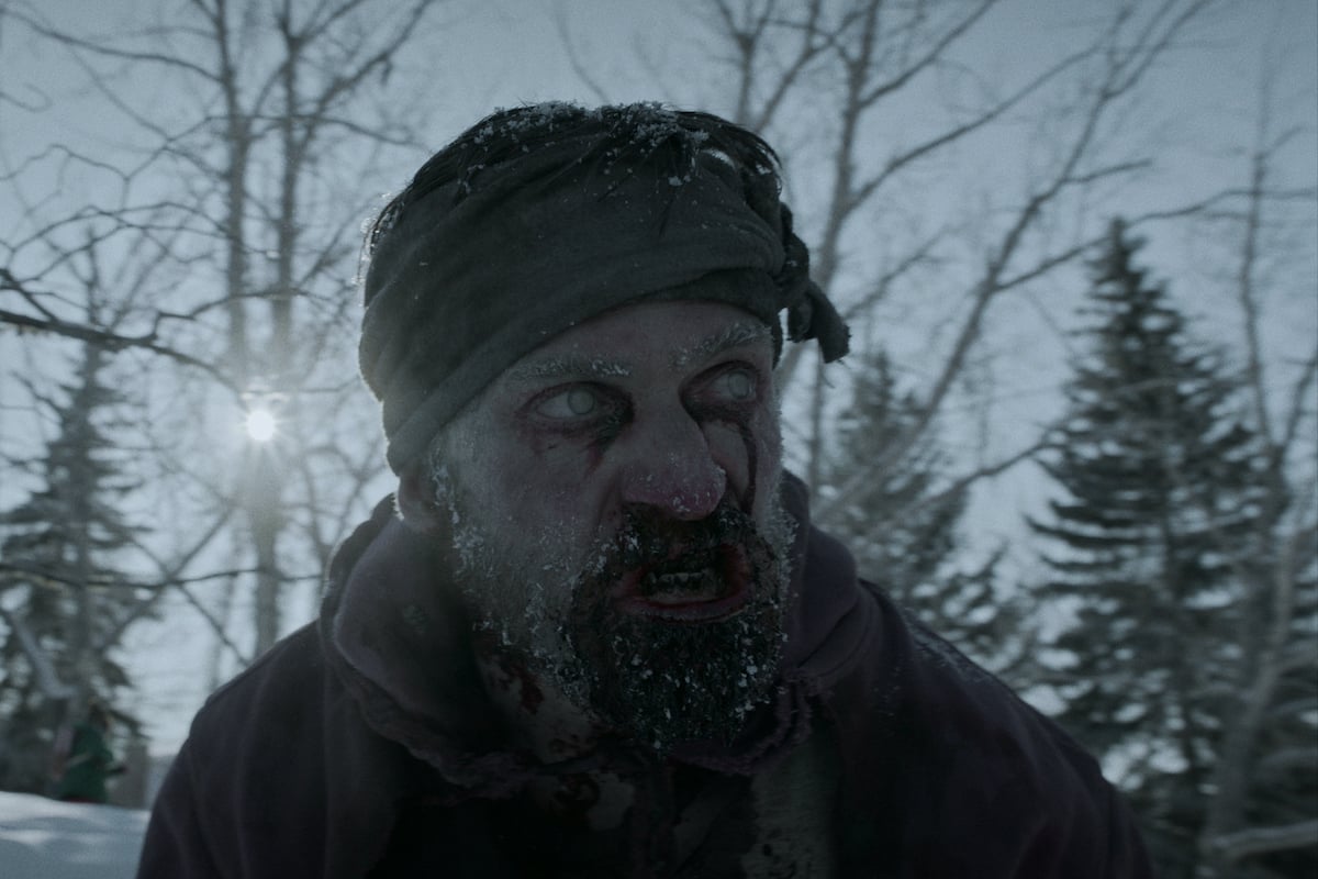 A zombie on the hunt in a scene from the Netflix series 'Black Summer'
