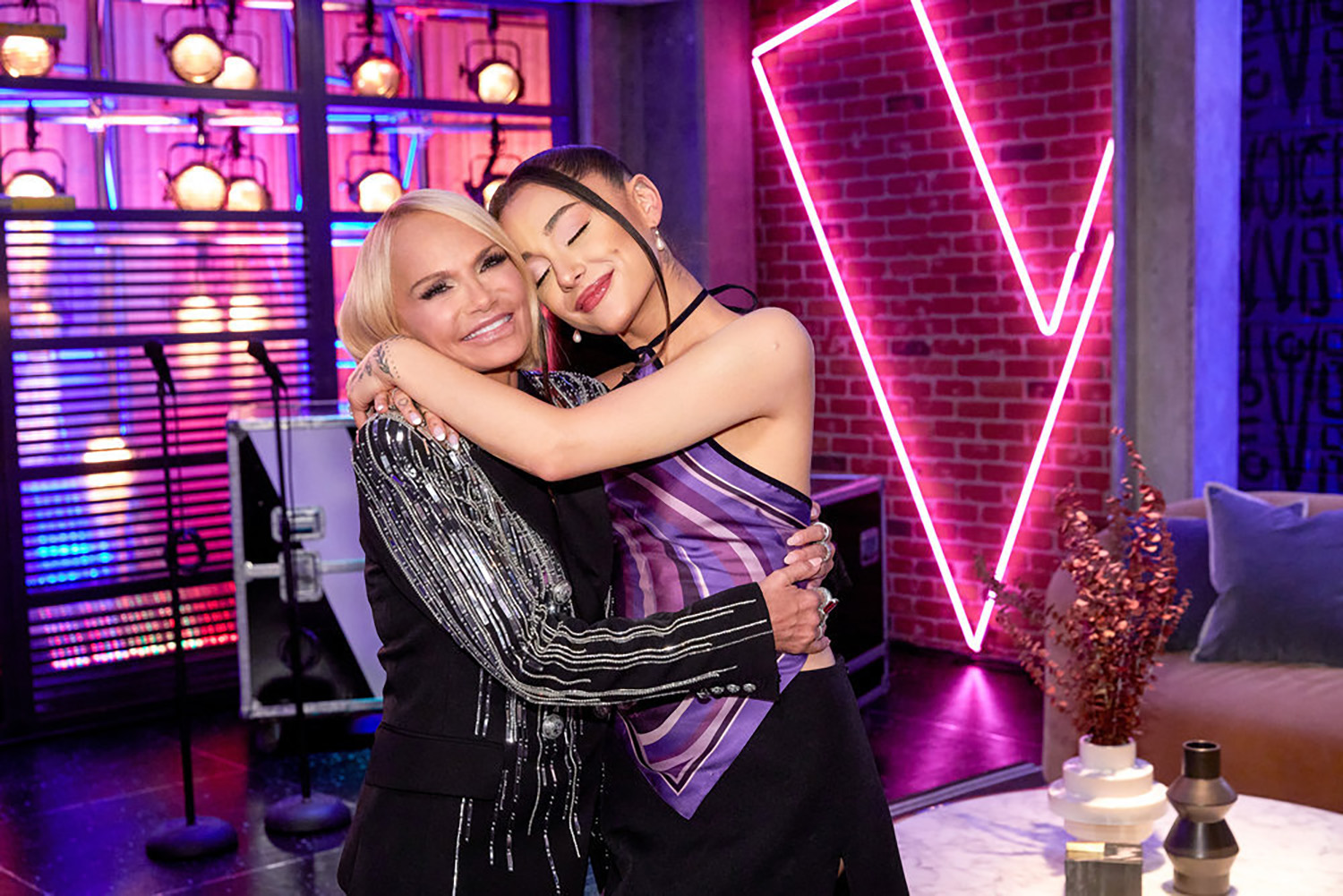 Ariana Grande and Kristin Chenoweth hugging on the set of The Voice Season 21