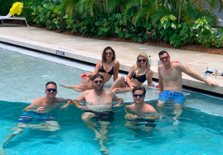 Below Deck crew hangs by the pool 