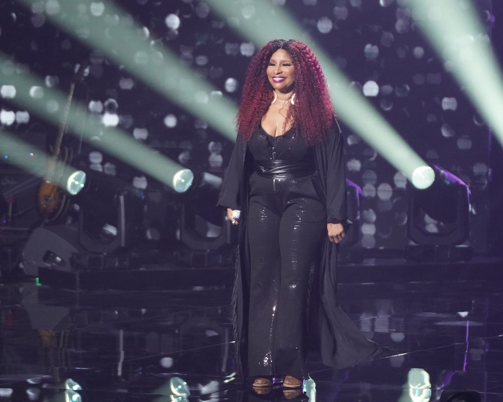 Chaka Kahn dressed in all black during a performance