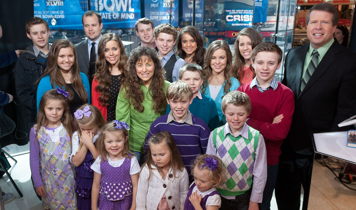Jim Bob and Michelle Duggar, who now have a growing number of grandchildren, visits "Extra" at their New York studios with their 19 kids.