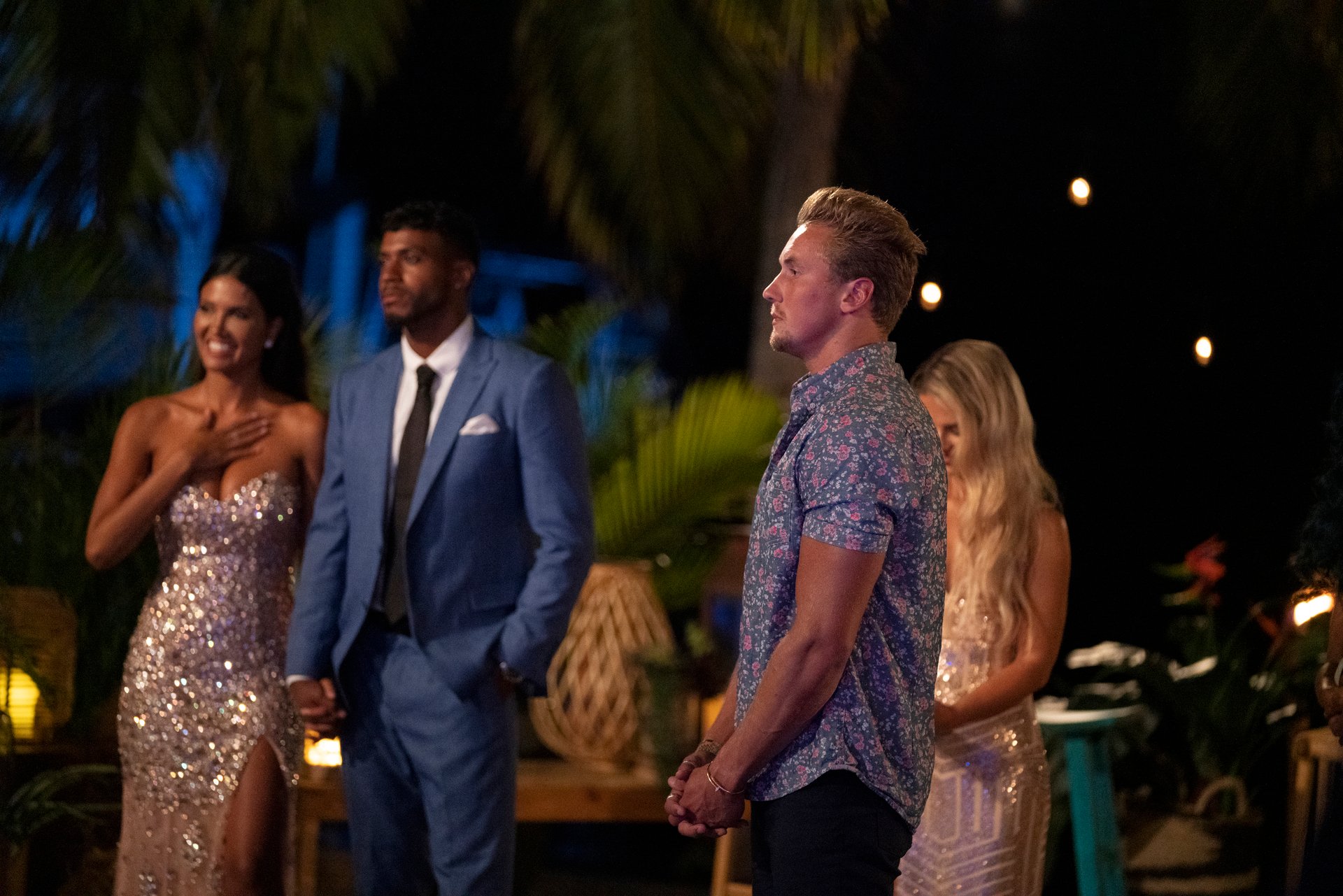 'FBoy Island' villain Garrett Morosky in a floral button down stands at the season finale.