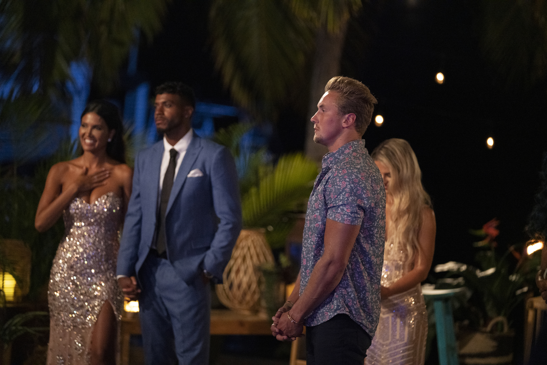 'FBoy Island' villain Garrett Morosky in a floral button down stands at the season finale.