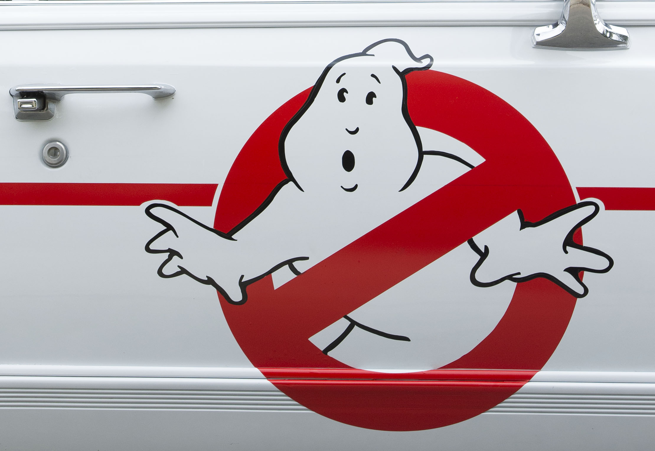The 'Ghostbusters'  logo on the side of the Ecto-1
