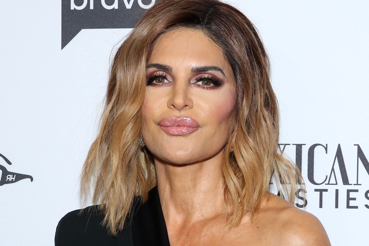 Lisa Rinna posing at an event in Hollywood