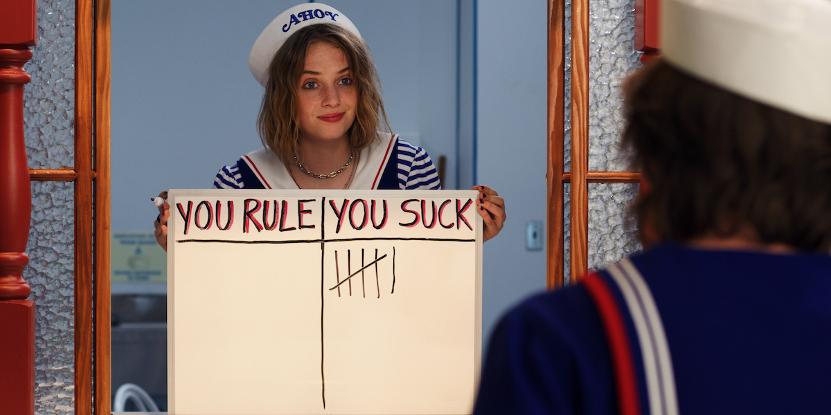 Maya Hawke in her Scoops Ahoy uniform in a scene from 'Stranger Things' Season 3.