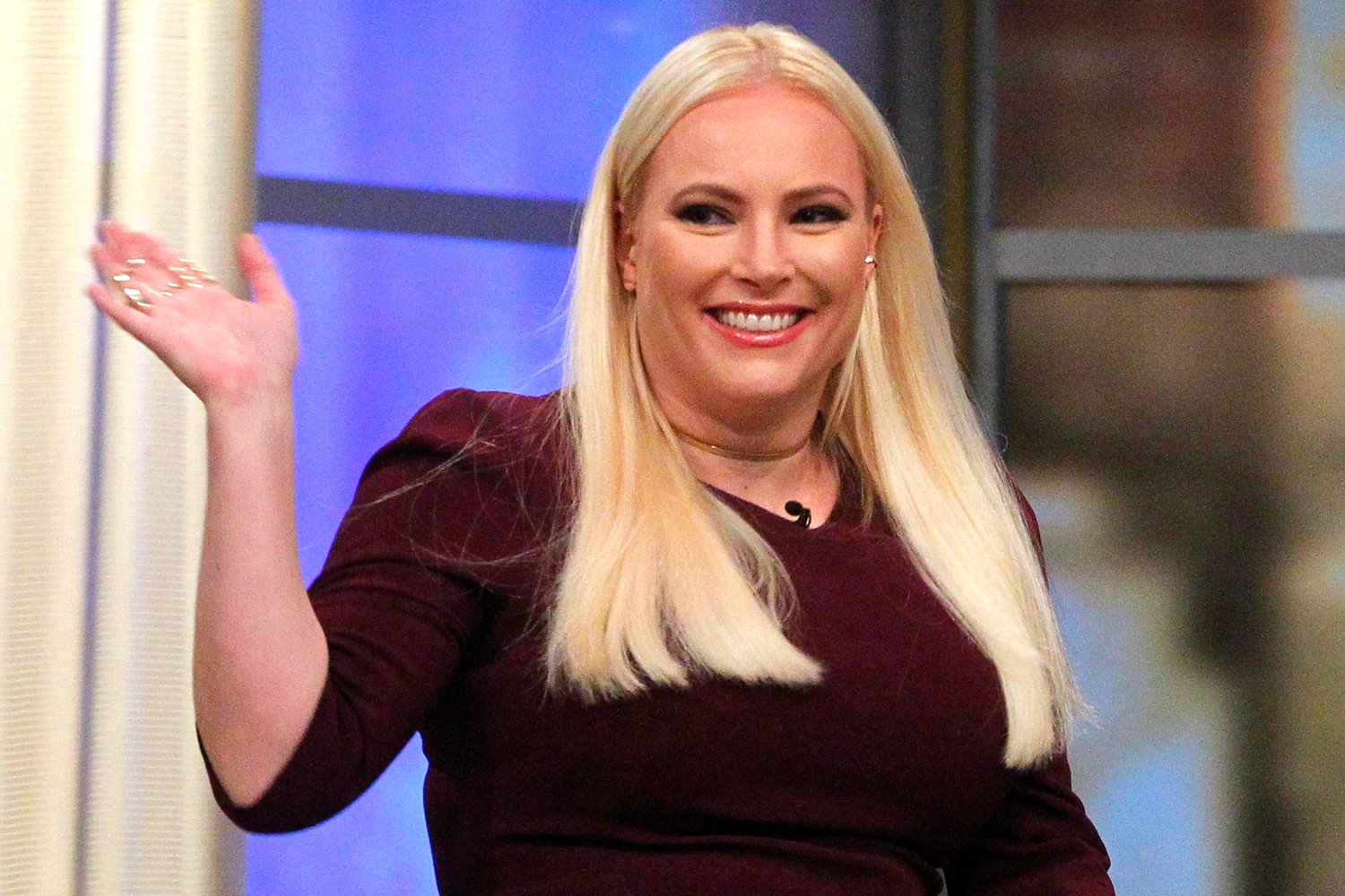 Meghan McCain waving as she enters 'The View' set