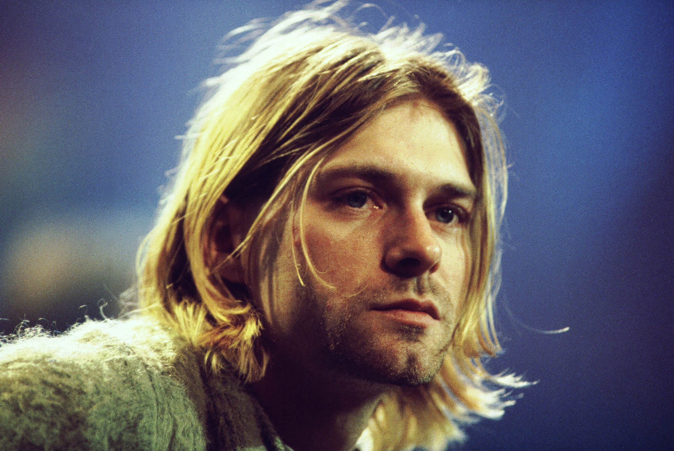 Kurt Cobain with a blue background