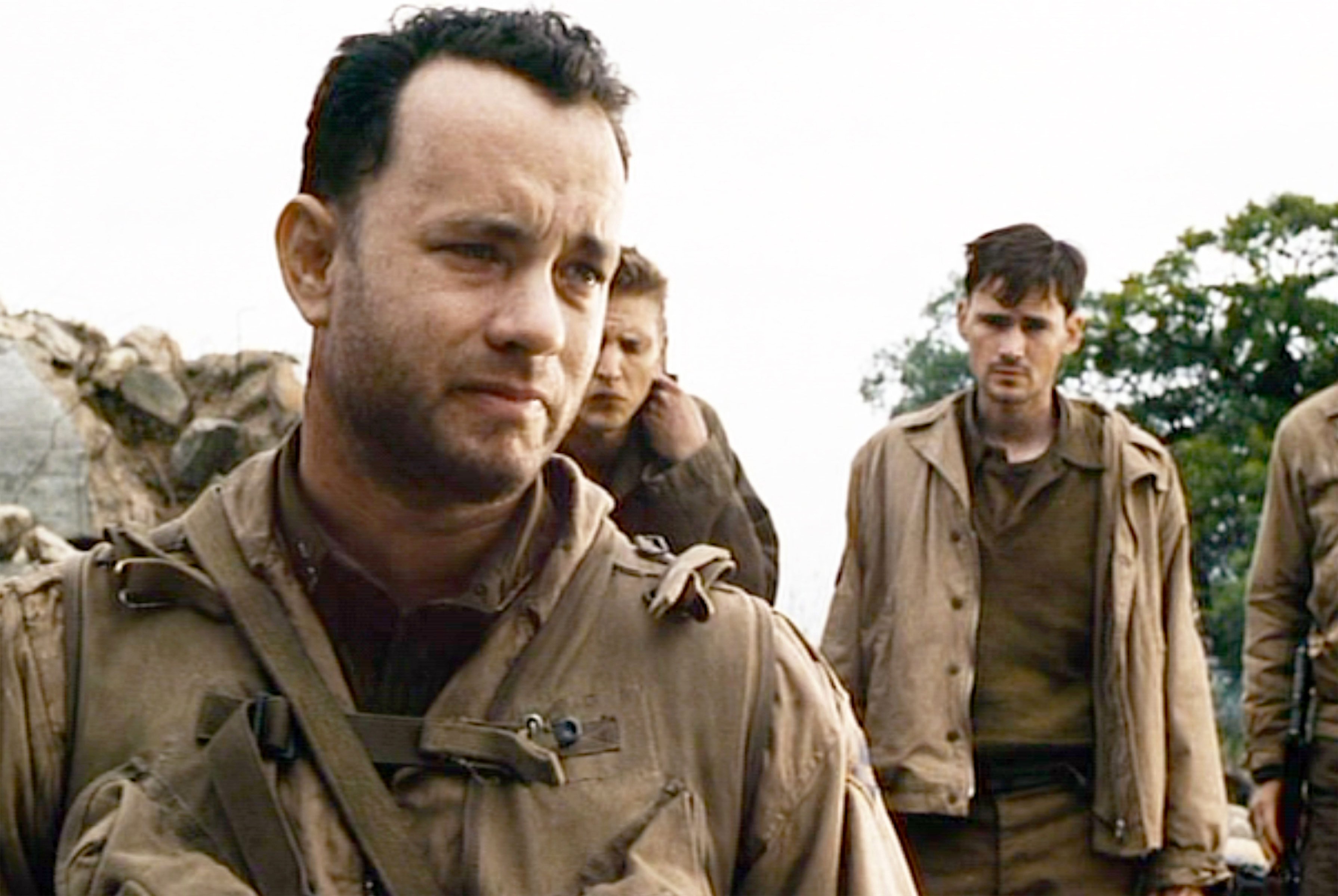 Tom Hanks surrounded by soldiers in Steven Spielberg's 'Saving Private Ryan'