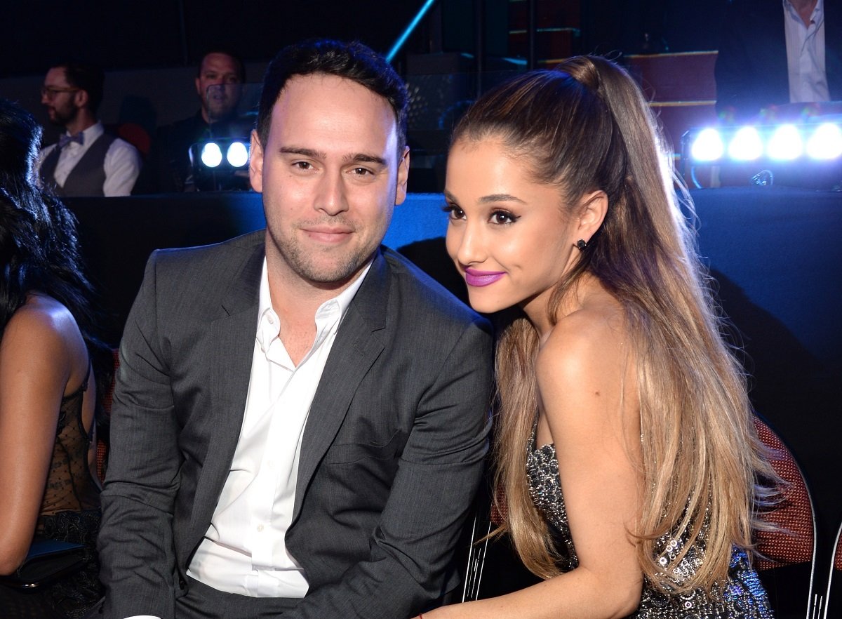 (L-R): Scooter Braun and Ariana Grande attend the 2014 MTV Video Music Awards on August 24, 2014. 