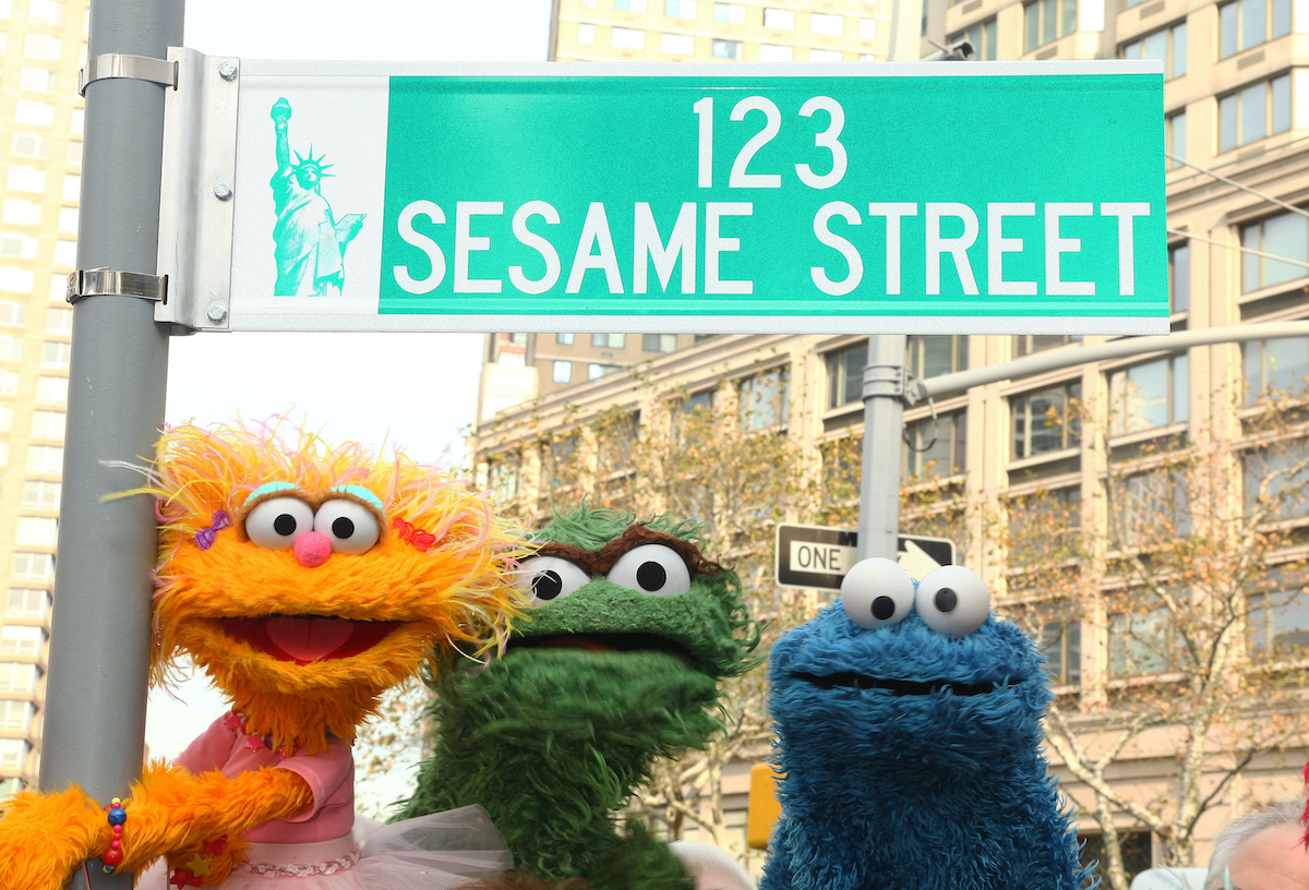 NEW YORK - NOVEMBER 09: Sesame Street characters pose under a "123 Sesame Street" sign at the "Sesame Street" 40th Anniversary temporary street renaming in Dante Park on November 9, 2009 in New York City. (Photo by Astrid Stawiarz/Getty Images)