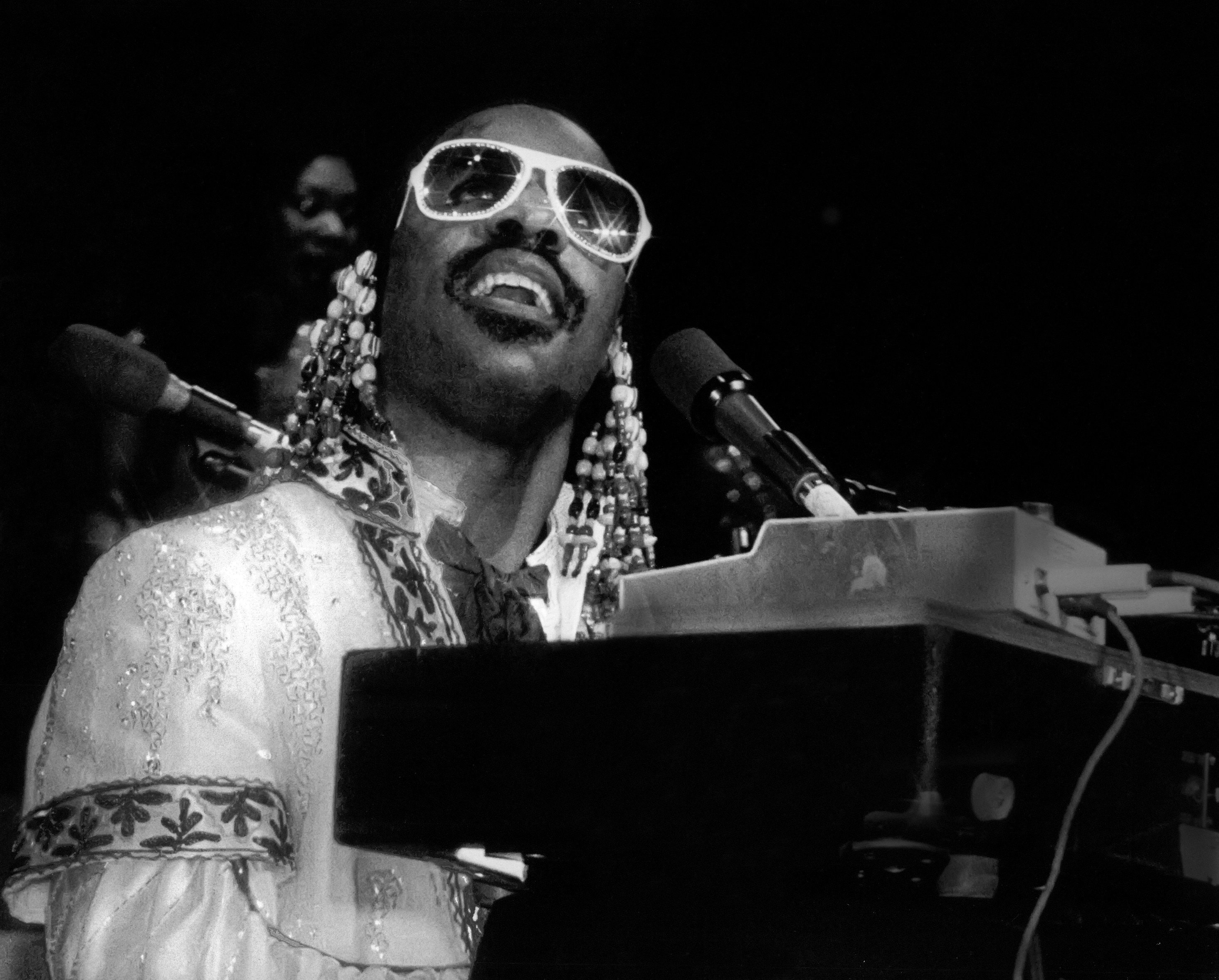 Stevie Wonder with a microphone