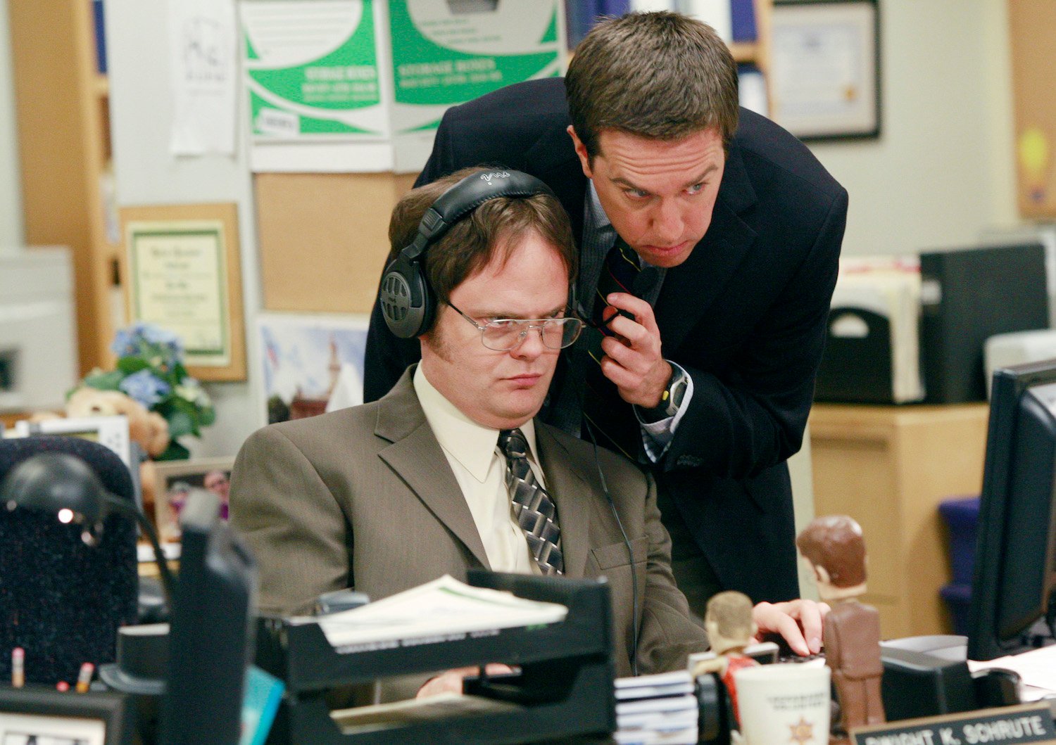 The Office stars Rainn Wilson as Dwight Schrute and Ed Helms as Andy Bernard during a scene