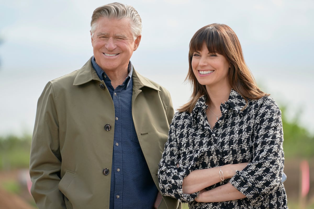 Treat Williams wearing a jacket and Meghan Ory with her arms crossed in 'Chesapeake Shores' Season 5
