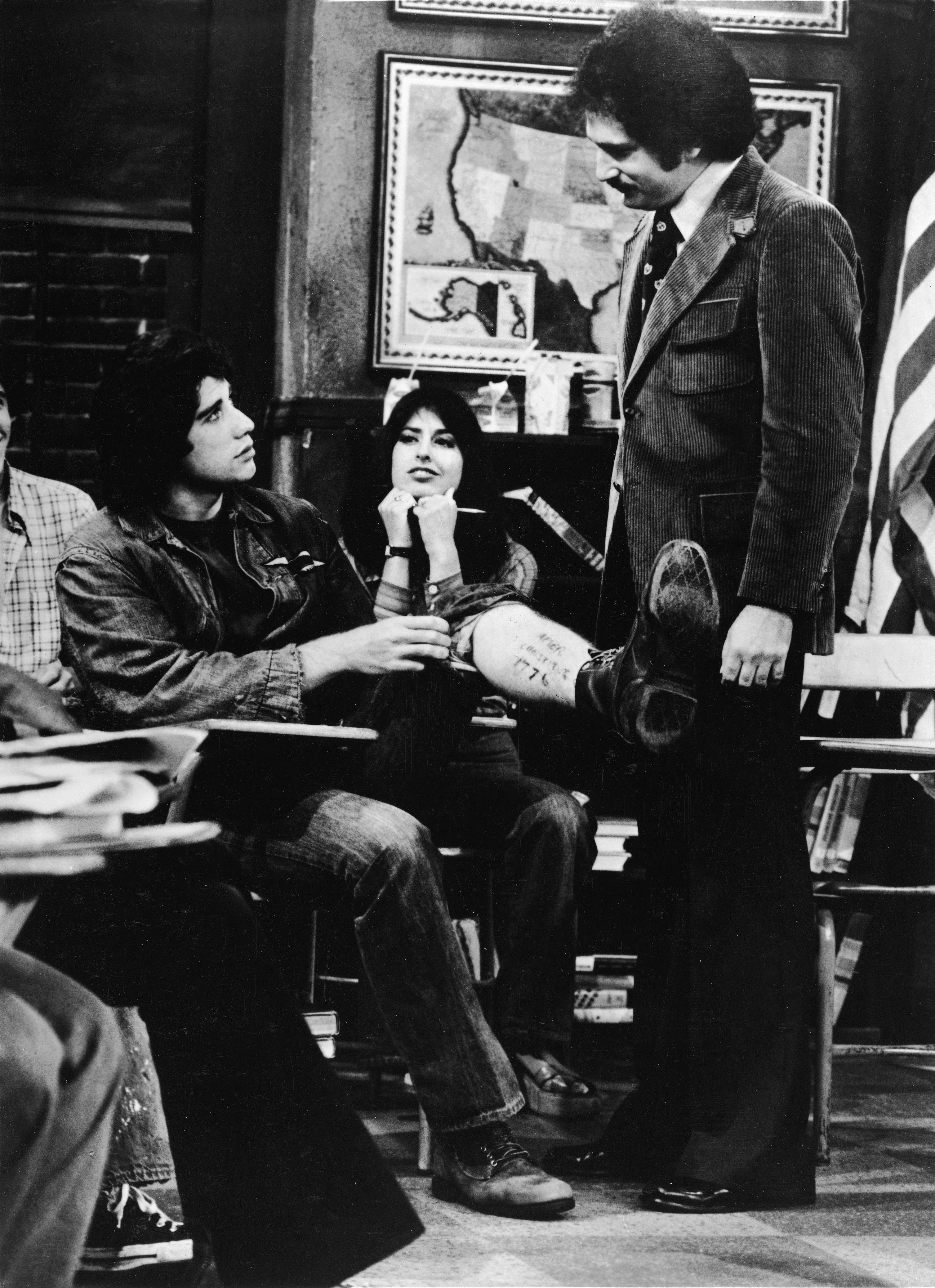 Vinnie Barbarino and Gabe Kotter in a classroom during the filming of 'Welcome Back, Kotter'