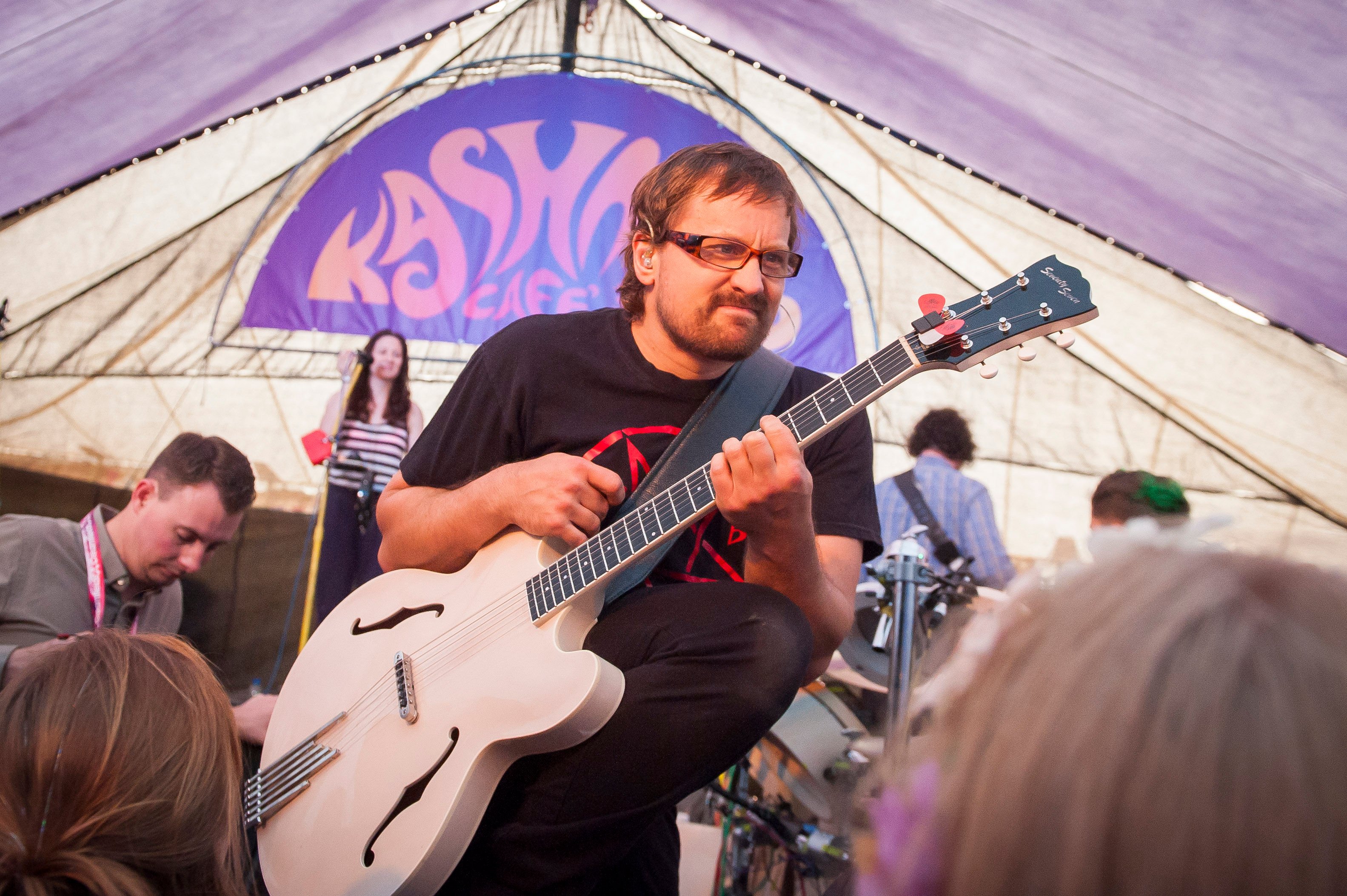 Brendan B. Brown from Wheatus holding a white guitar