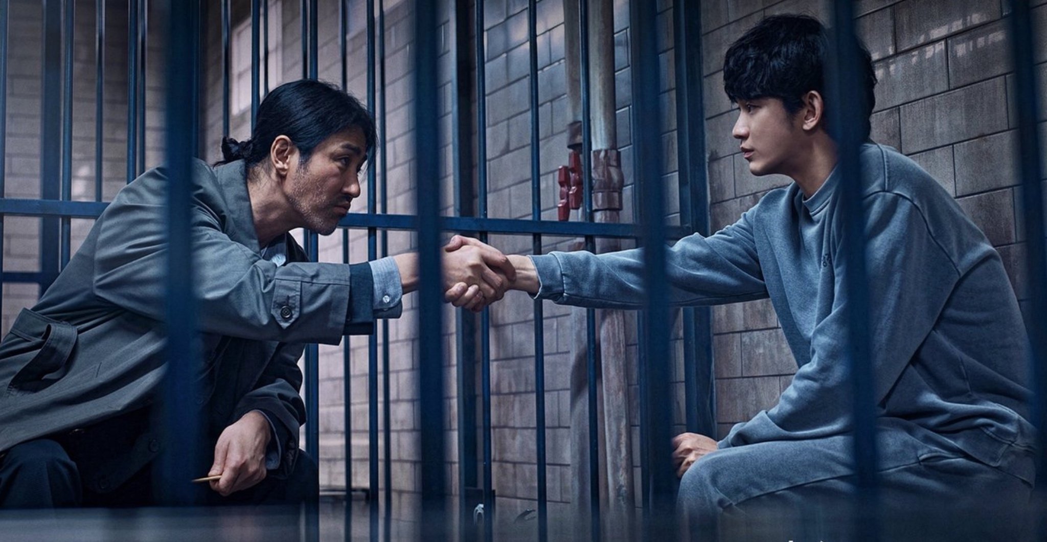 Actors Cha Seung-Won and Kim Too-Hyun for 'One Ordinary Day' K-drama shaking hands in jail cell