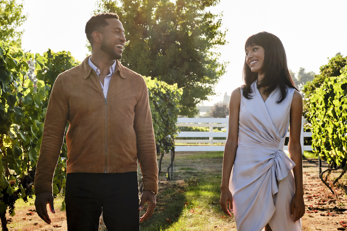 Brooks Darnell and Erinn Westbrook walking in a vineyard in 'Advice to Love By'