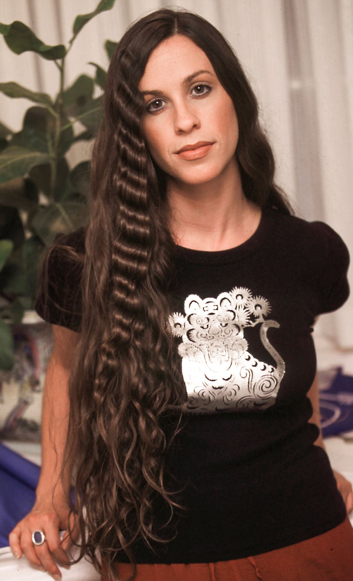 Alanis Morissette with long hair