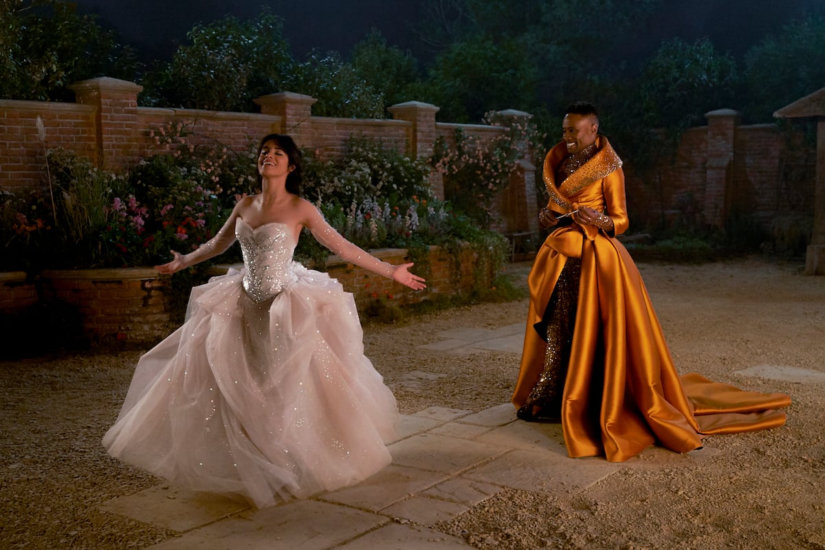 Camila Cabello and Billy Porter in Amazon's 'Cinderella.' Cabello's Cinderella wears a light pink ballgown magically created by Porter's Fab G (aka the Fairy Godmother). The Amazon 'Cinderella' costumes were made by Ellen Mirojnick, who also designed the costumes for Disney's 1997 'Cinderella' starring Brandy.