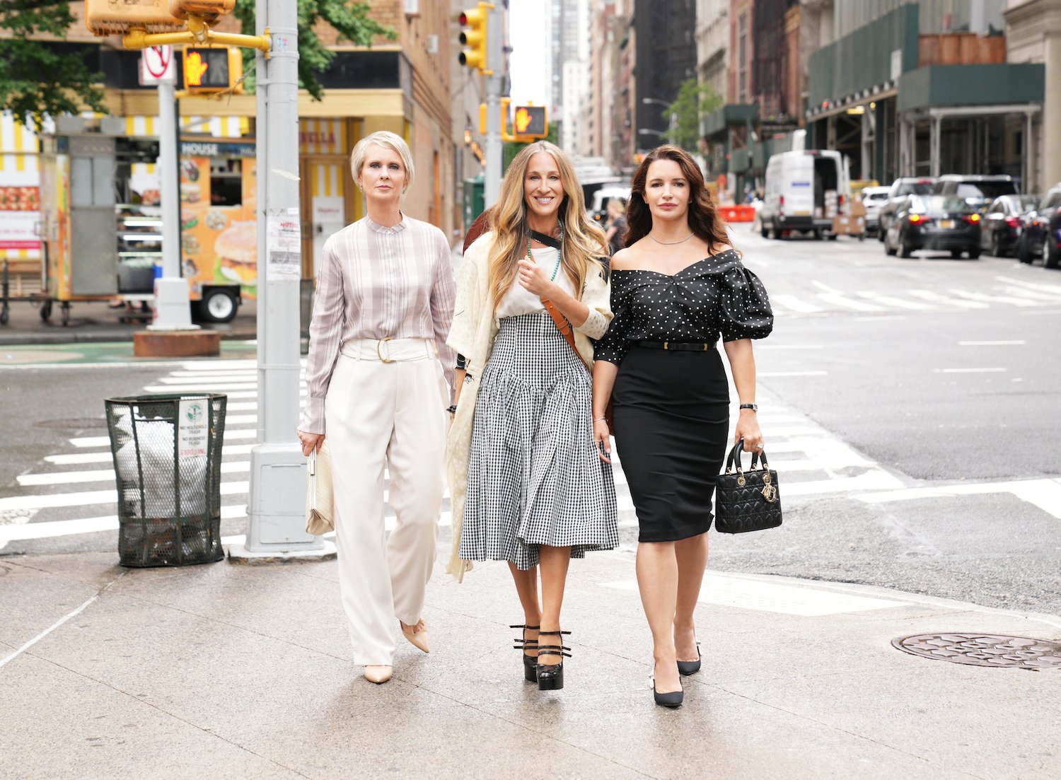 'And Just Like That' trio Miranda Hobbes, Carrie Bradshaw, and Charlotte York walks down the street