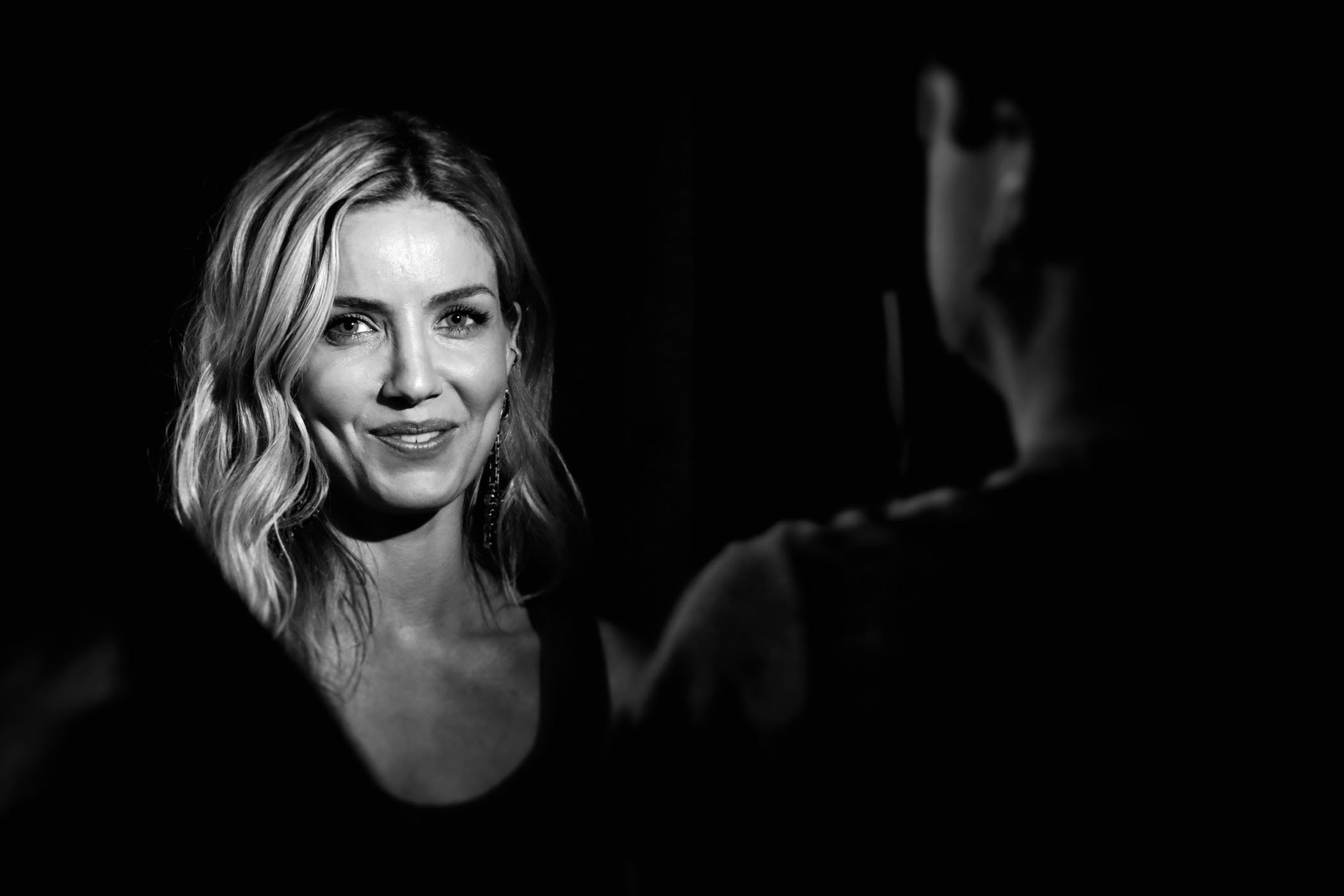 A black and white photo of Annabelle Wallis, Grace in 'Peaky Blinders' Season 6 