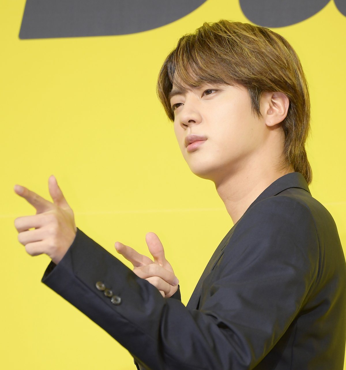 Jin of BTS attends a press conference for BTS's new digital single 'Butter', posing for the camera