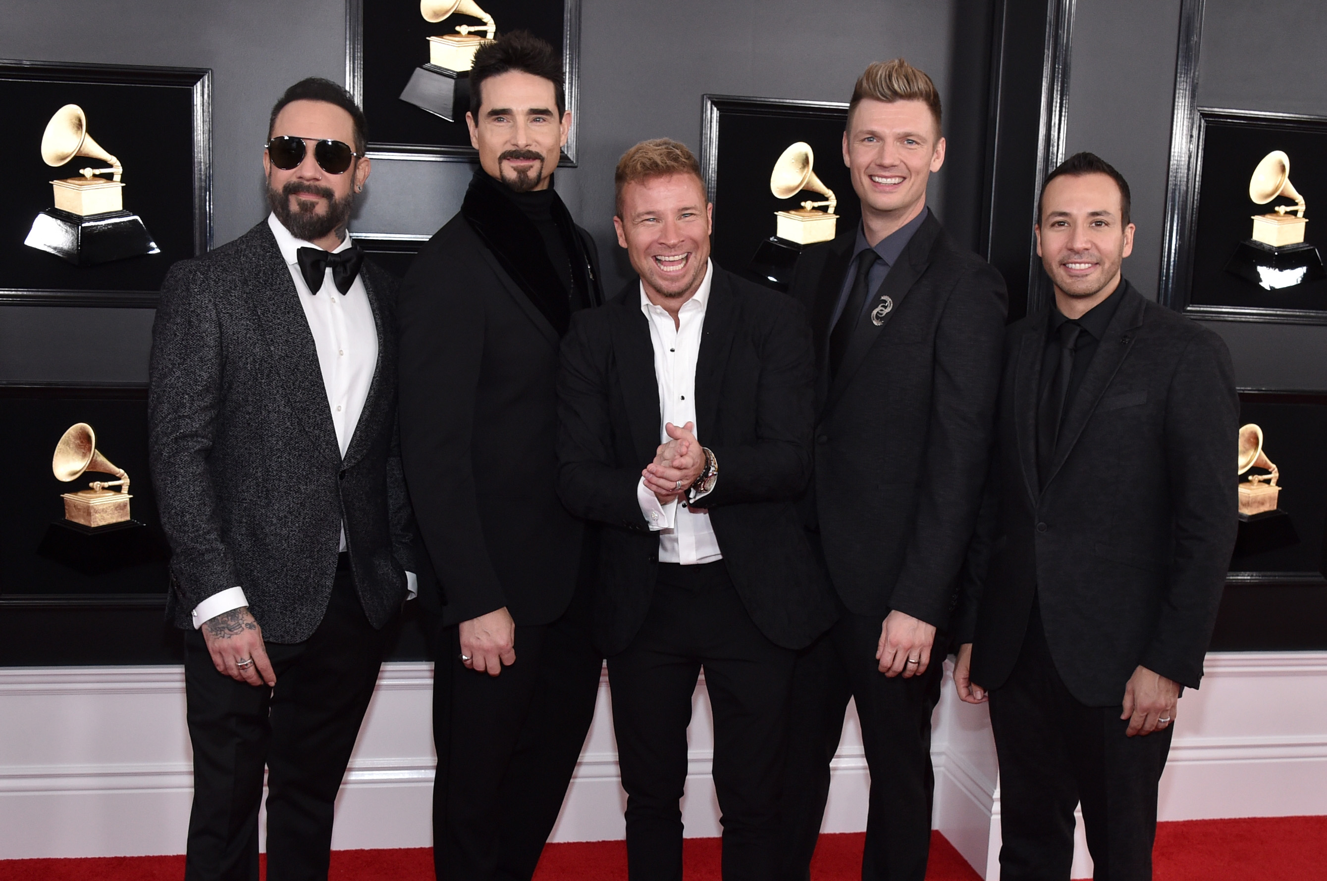 The Backstreet Boys wear dark suits while attending the Grammy Awards in 2019