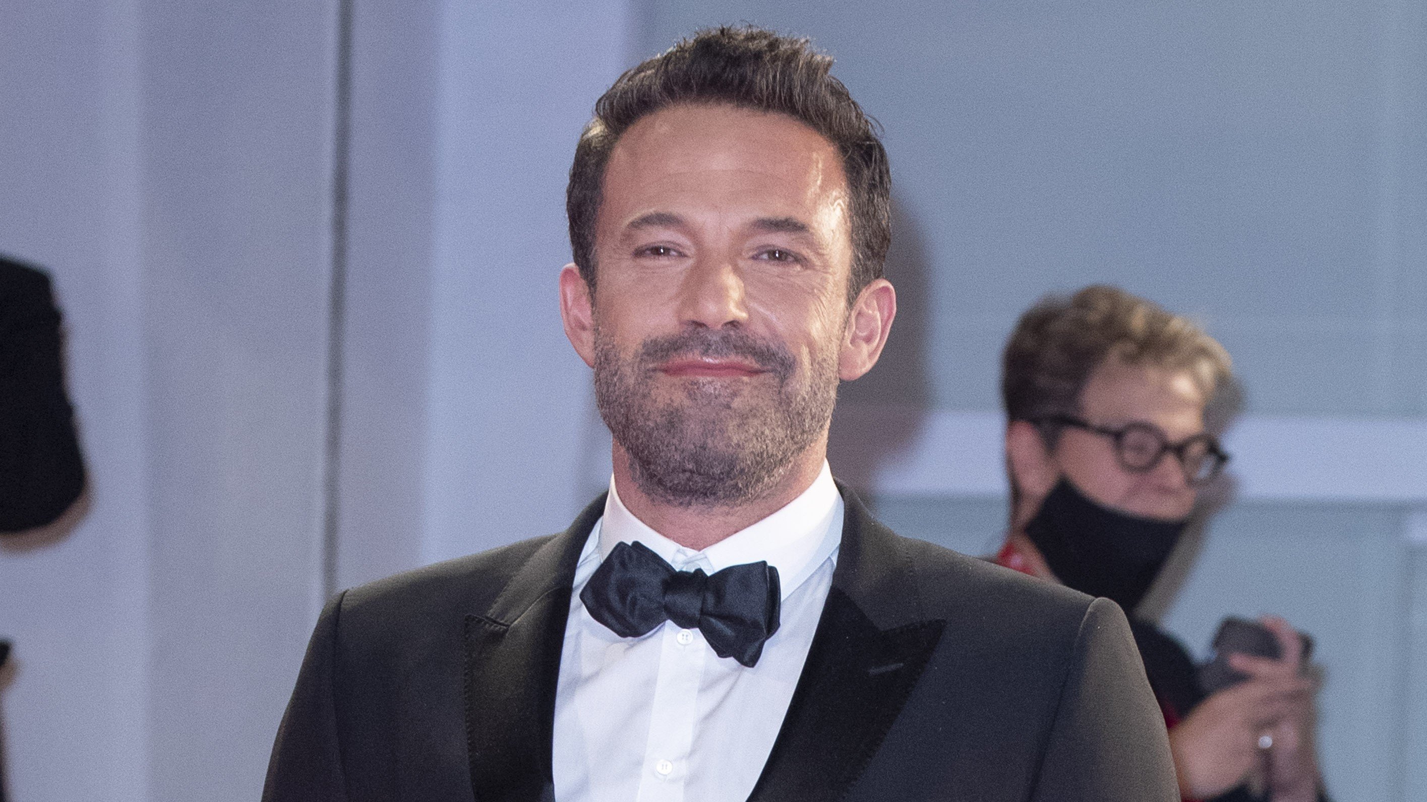 Ben Affleck in a suit and bow-tie.