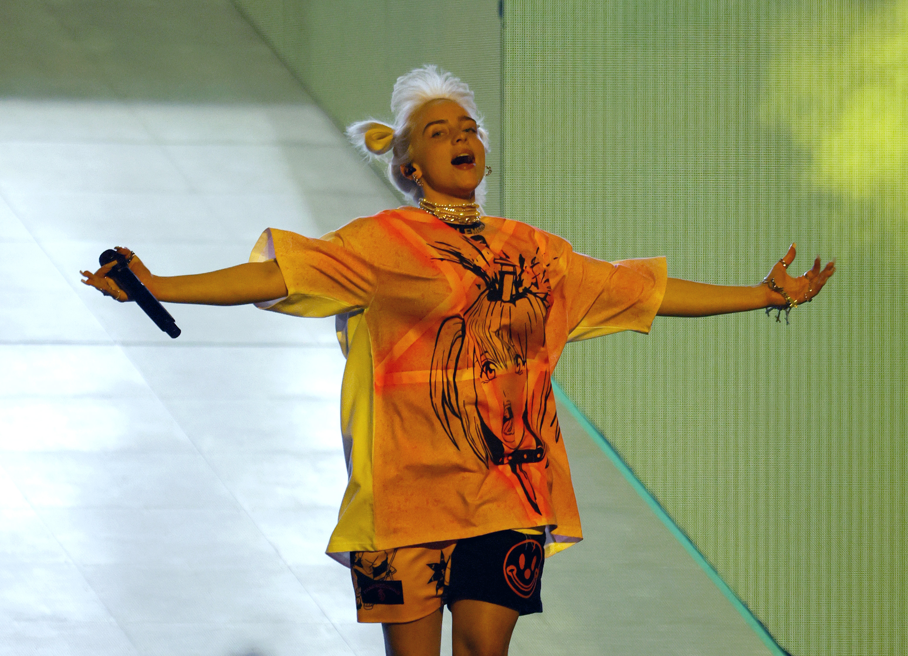 Billie Eilish jumps up and down during her performance at the 2021 iHeartRadio Music Festival at T-Mobile Arena on September 18, 2021 in Las Vegas, Nevada.