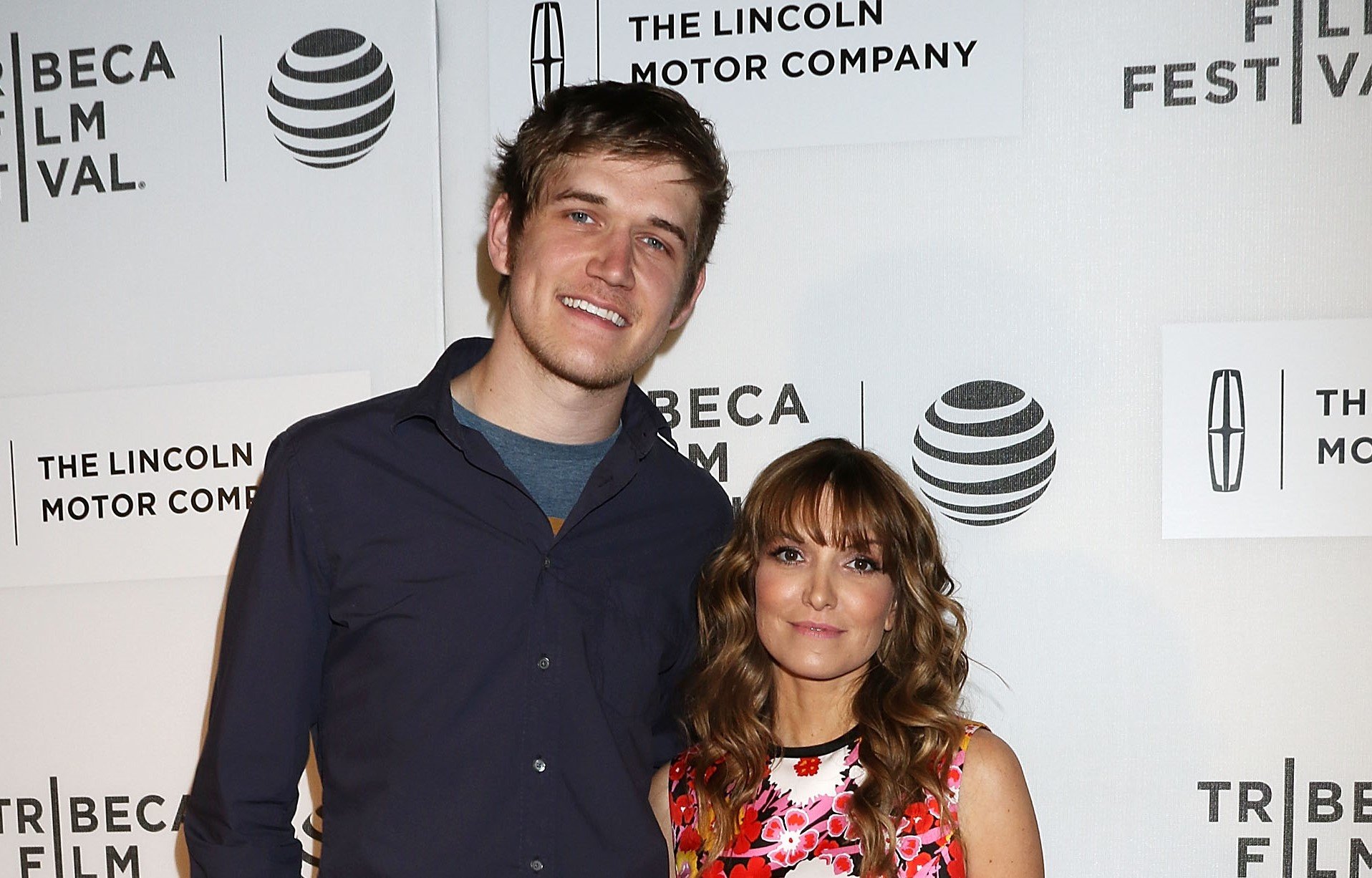 Bo Burnham and Lorene Scafaria stand next to each other at a film premiere. 