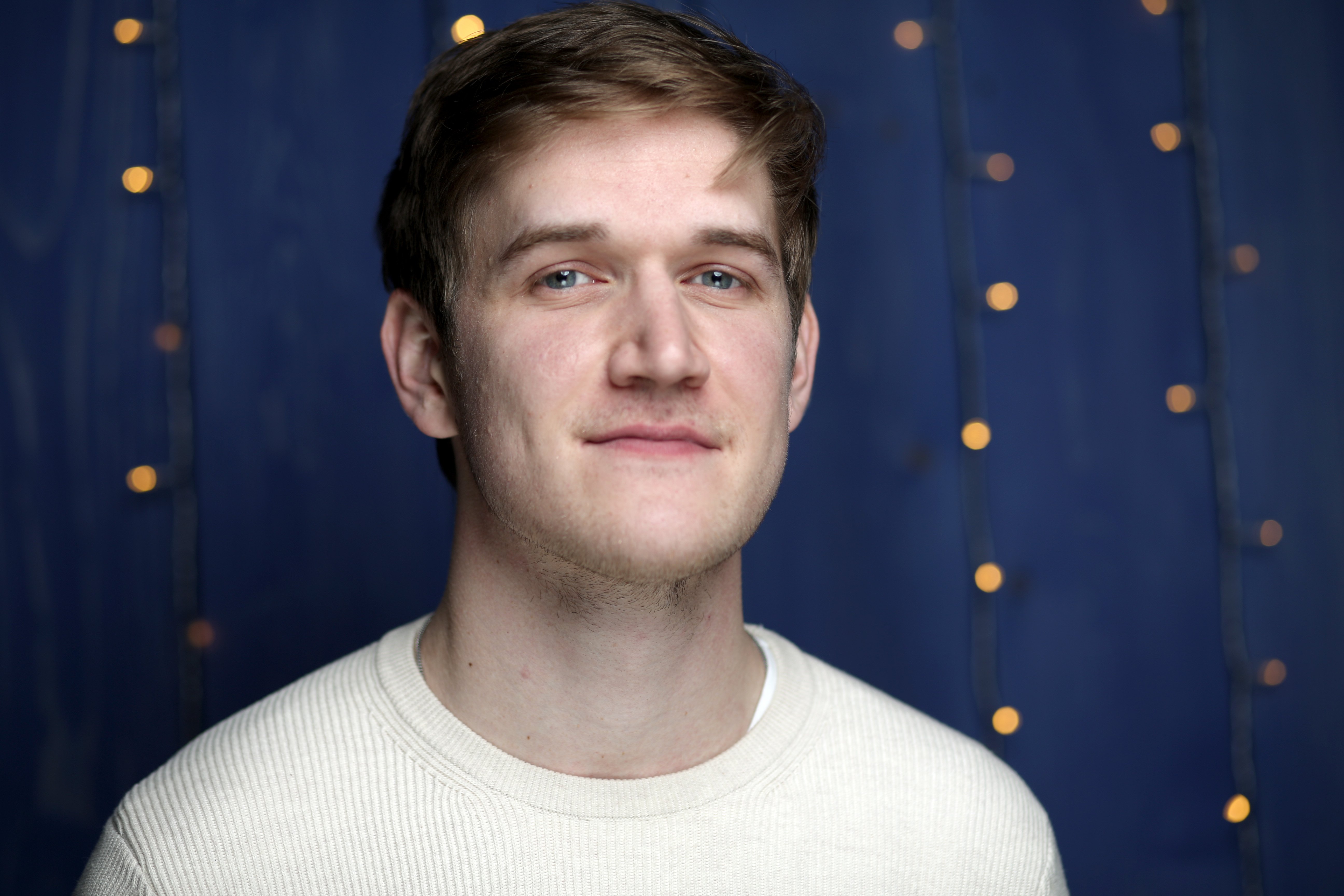 2021 Emmy nominee Bo Burnham in a white shirt.