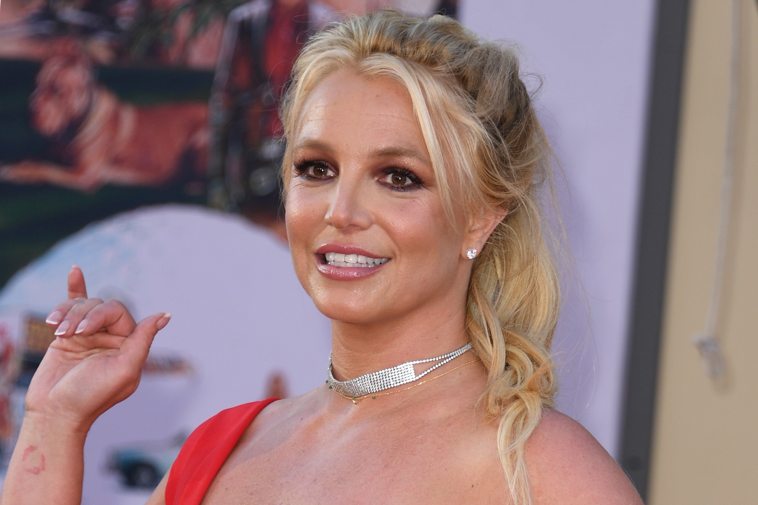 Britney Spears, in a red dress, at the premiere of the movie 'One Upon a Time in Hollywood' in 2019.