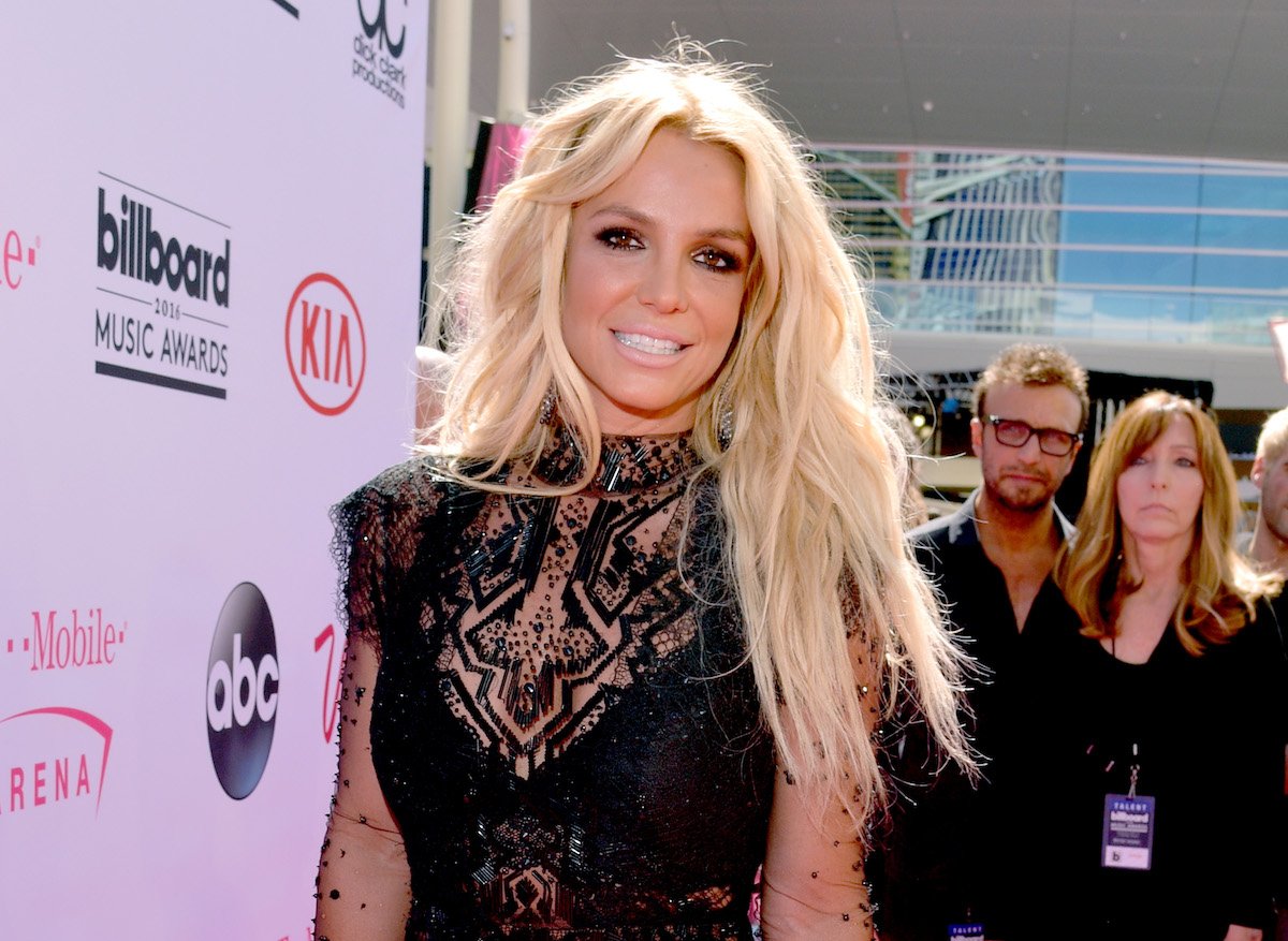 Britney Spears in black lace mini dress