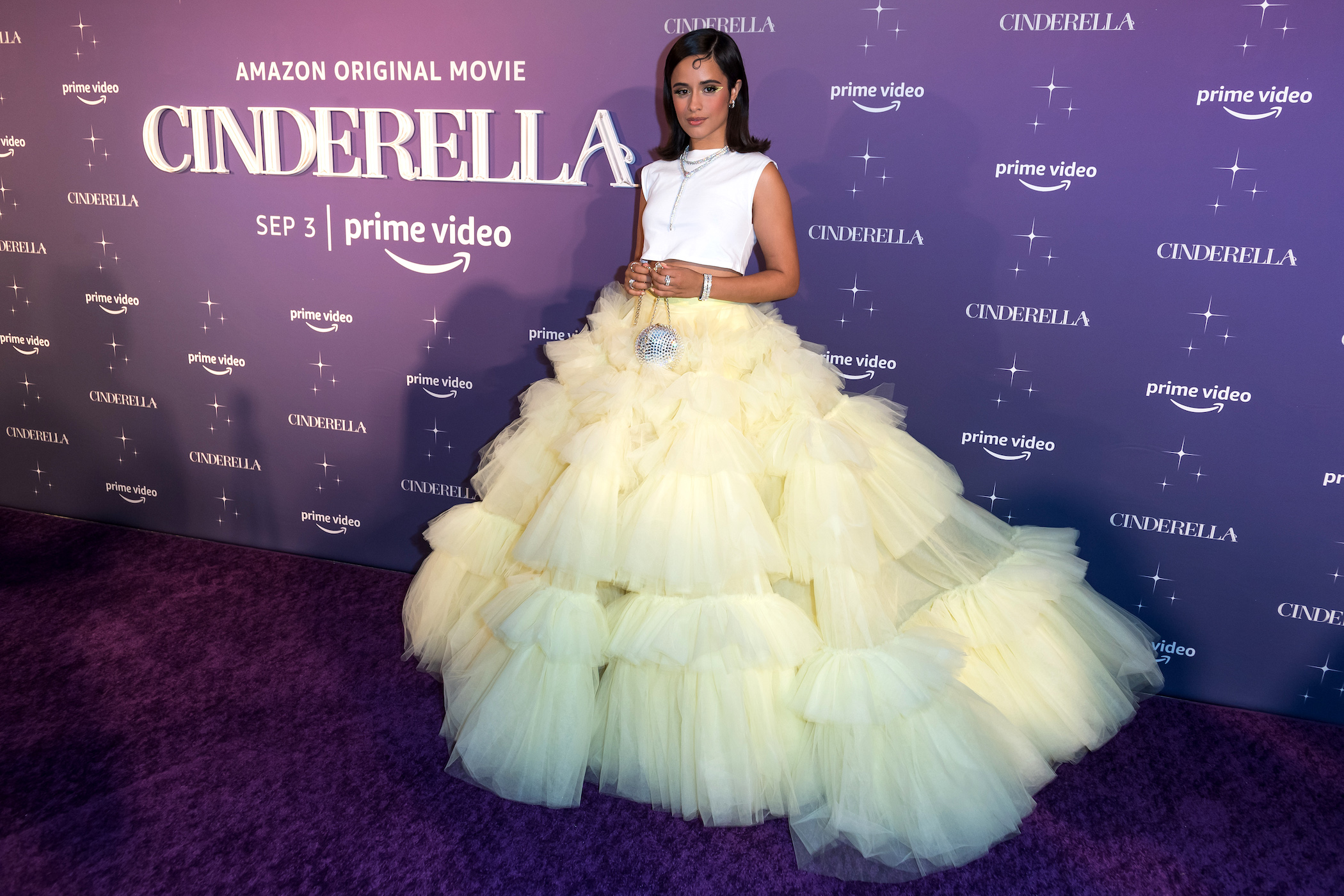 In one of her Cinderella dresses, Camila Cabello steps out in Miami at the Cinderella premiere