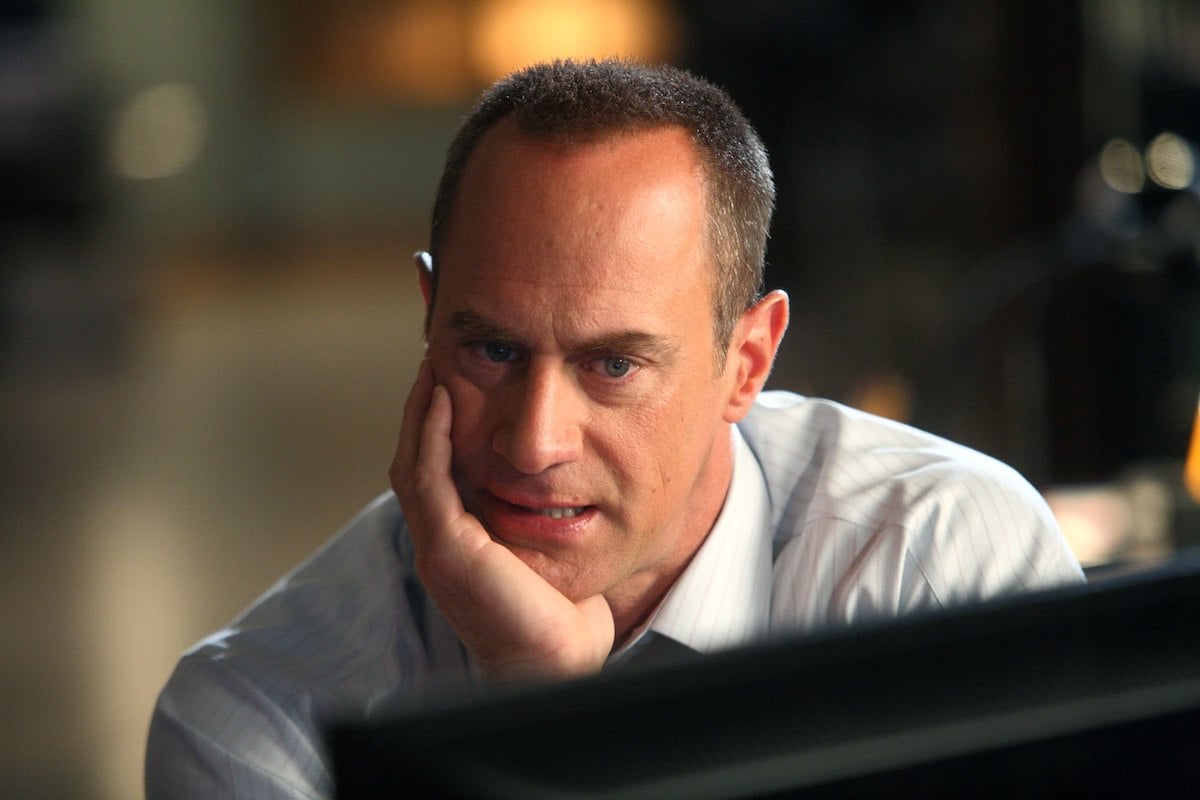 Christopher Meloni with a hand on his face in 'Law & Order: SVU'