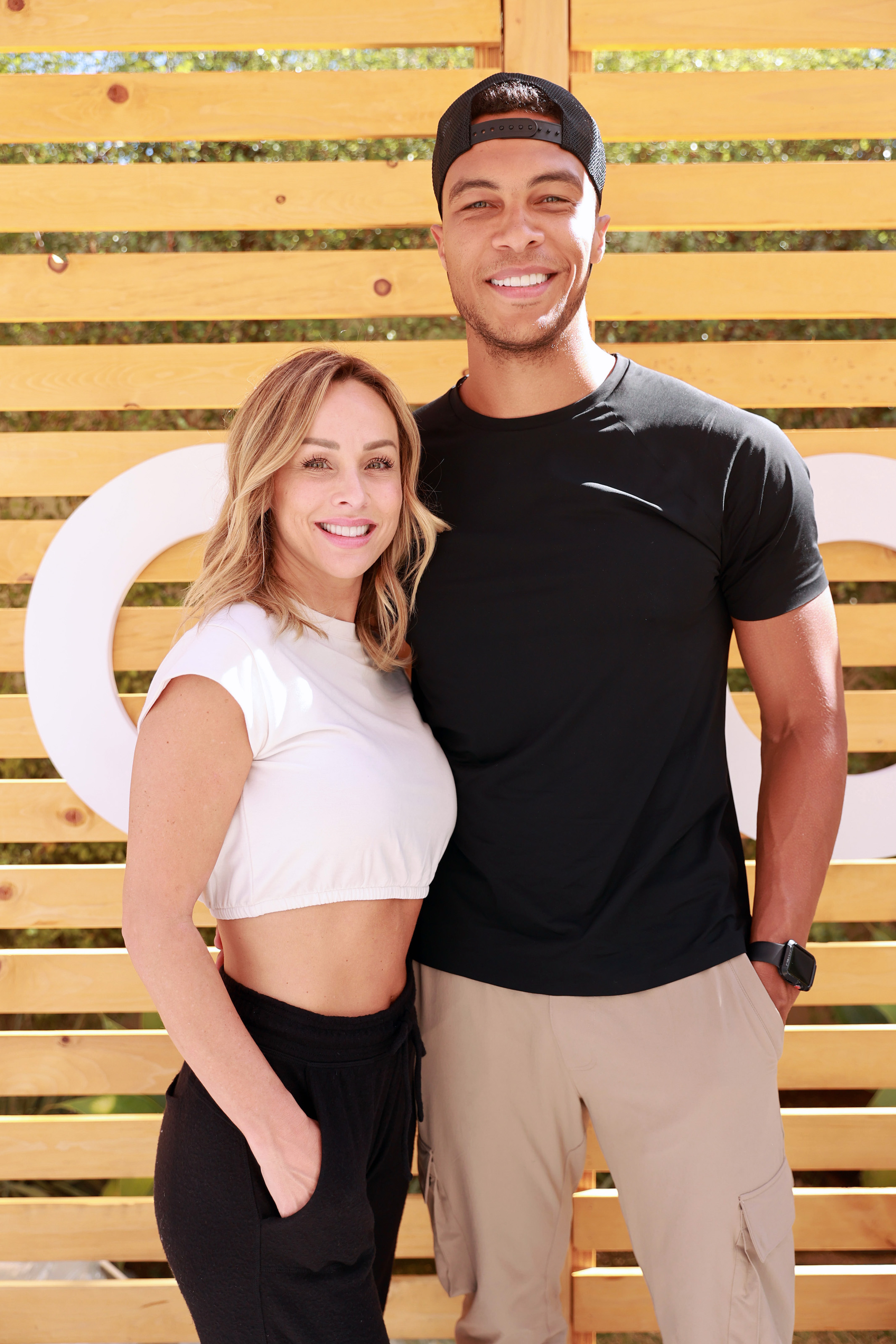 Clare Crawley and Dale Moss from 'The Bachelorette' with their arms around each other smiling at the camera