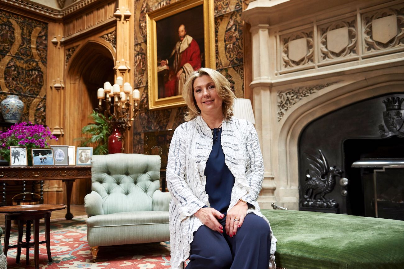 Countess Carnarvon sitting in the living room at Highclere Castle. 