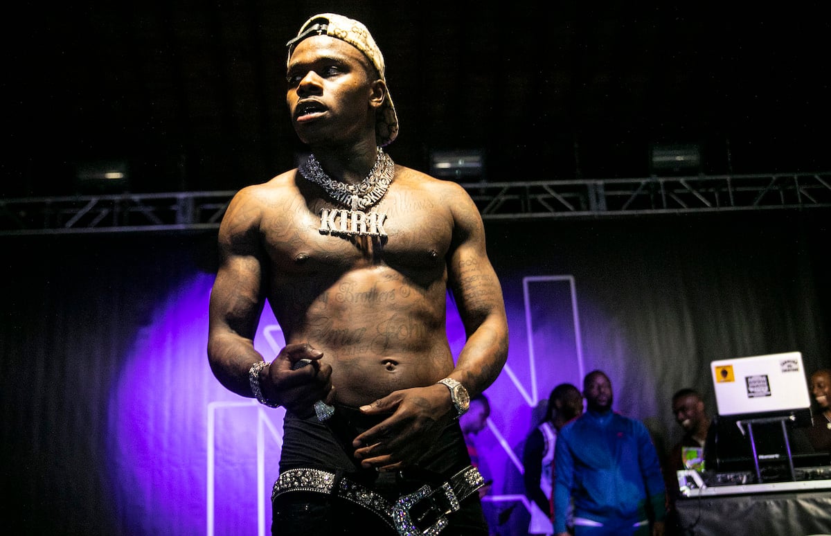 DaBaby appears shirtless with a diamond chain performs on October 09, 2019 in Charlotte, North Carolina. 