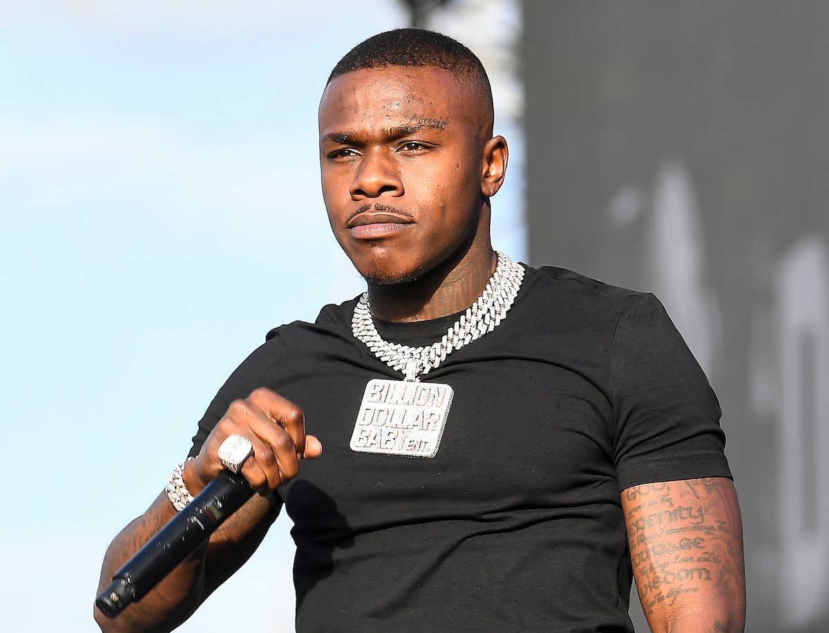 DaBaby wears a black shirt and diamond chain as he performs at the 2019 Rolling Loud Music Festival at Oakland-Alameda County Coliseum on September 29, 2019 in Oakland, California.  