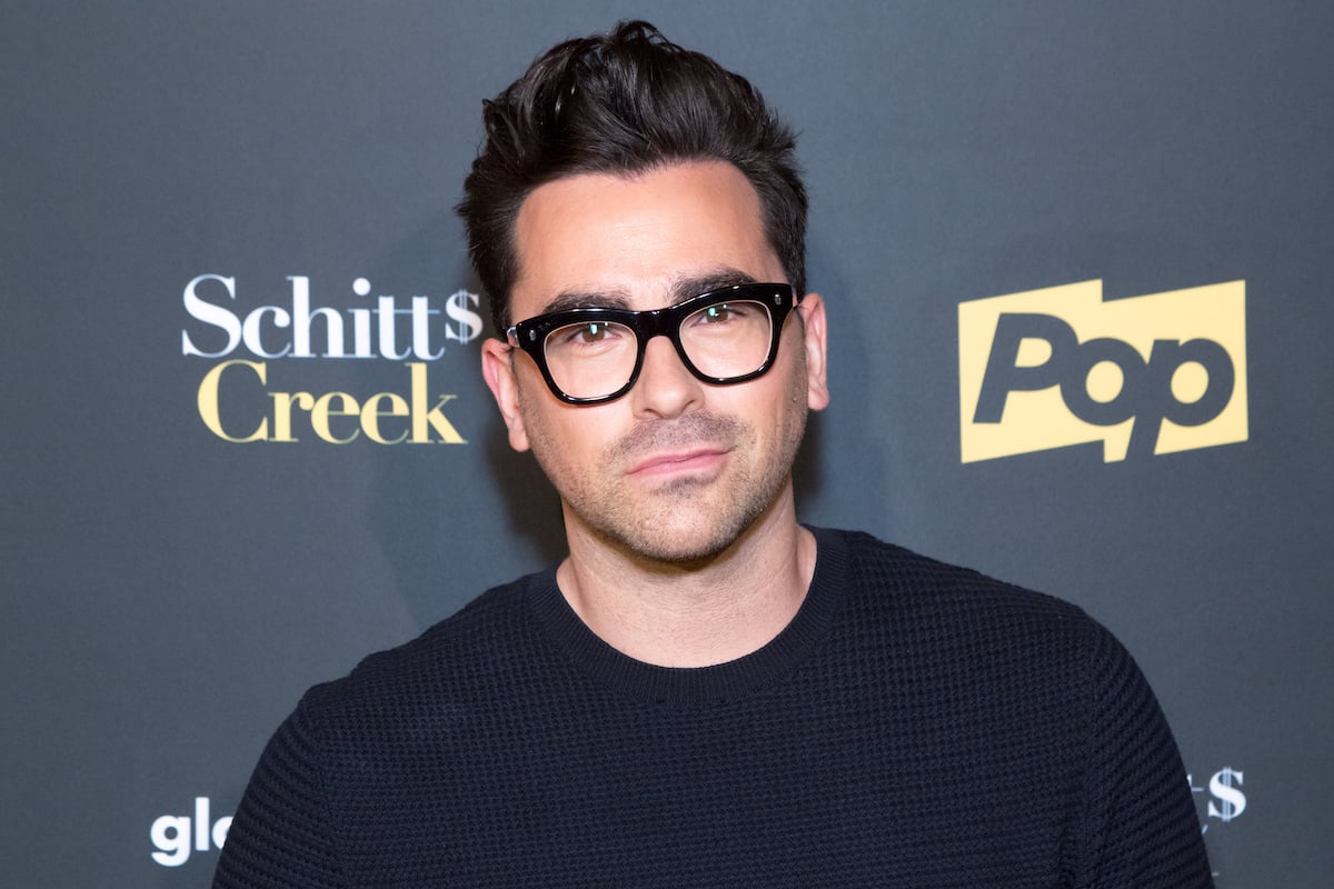 Dan Levy at Netflix/Pop TV event wearing black