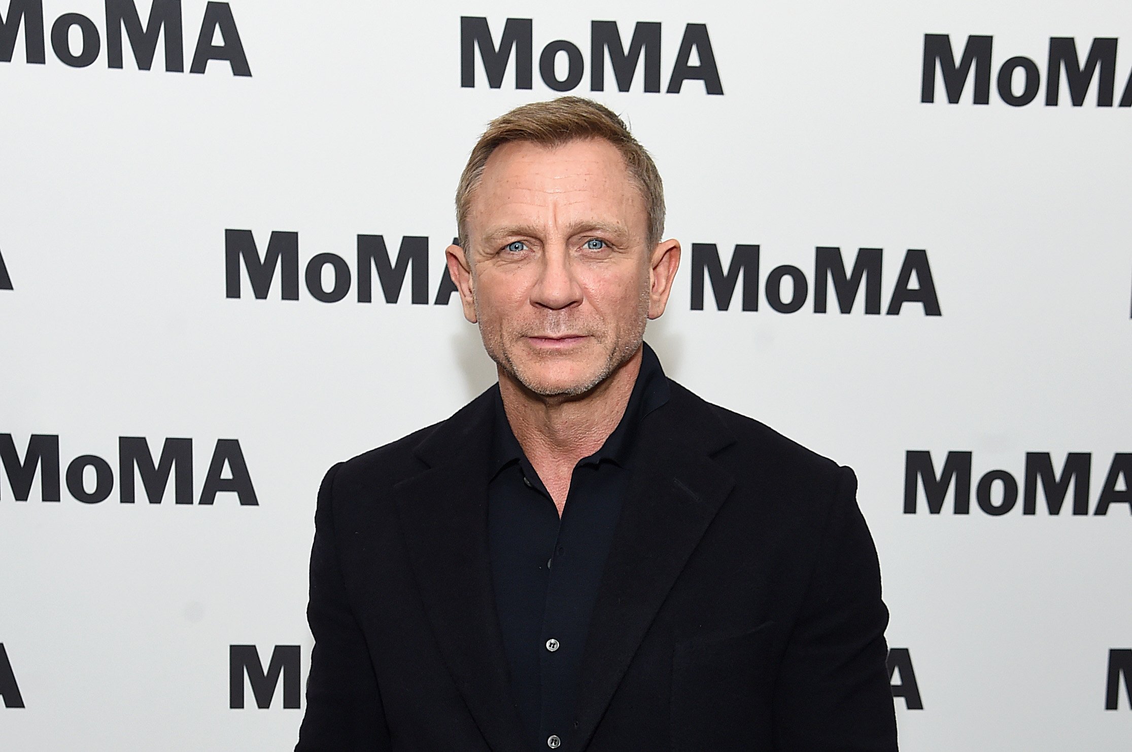 Daniel Craig, in a black jacket and blue shirt, at the Museum of Modern Art in New York City in 2020.