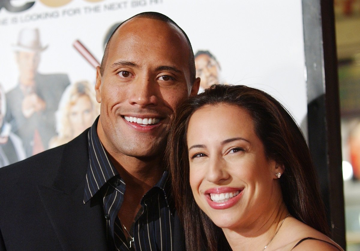 Dwayne Johnson and Dany Garcia smiling