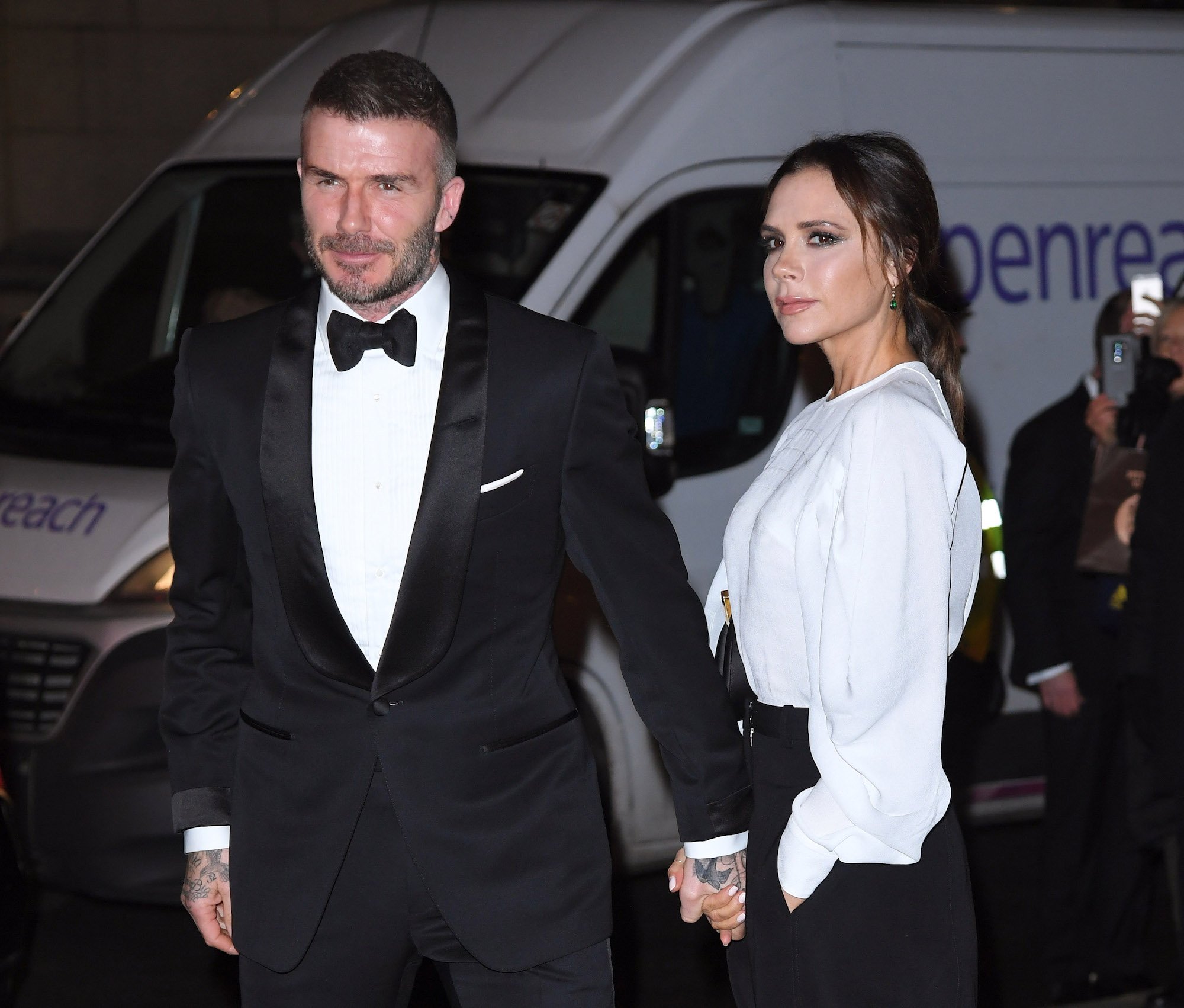 David and Victoria Beckham attending the TRICS Awards in 2019
