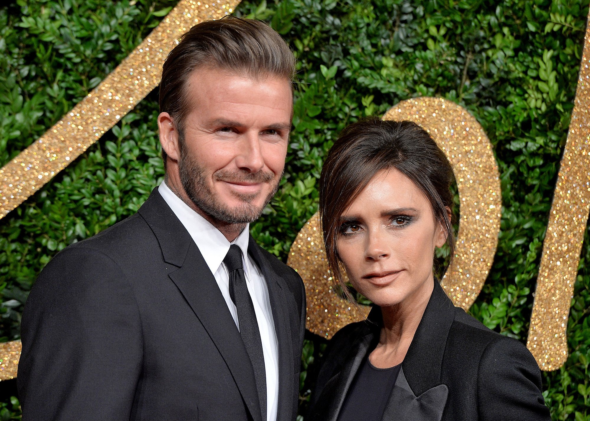 David and Victoria Beckham attending the 2015 British Fashion Awards