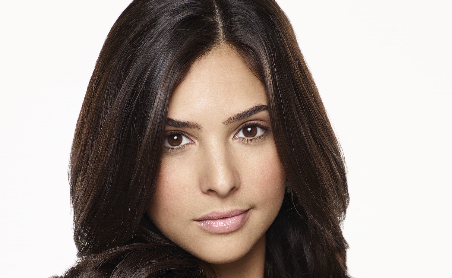 Days of Our Lives star Camila Banus as Gabi, in a headshot against a white background